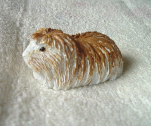 Next is a wonderful Coronet guinea pig figurine, also a lovely present from 
